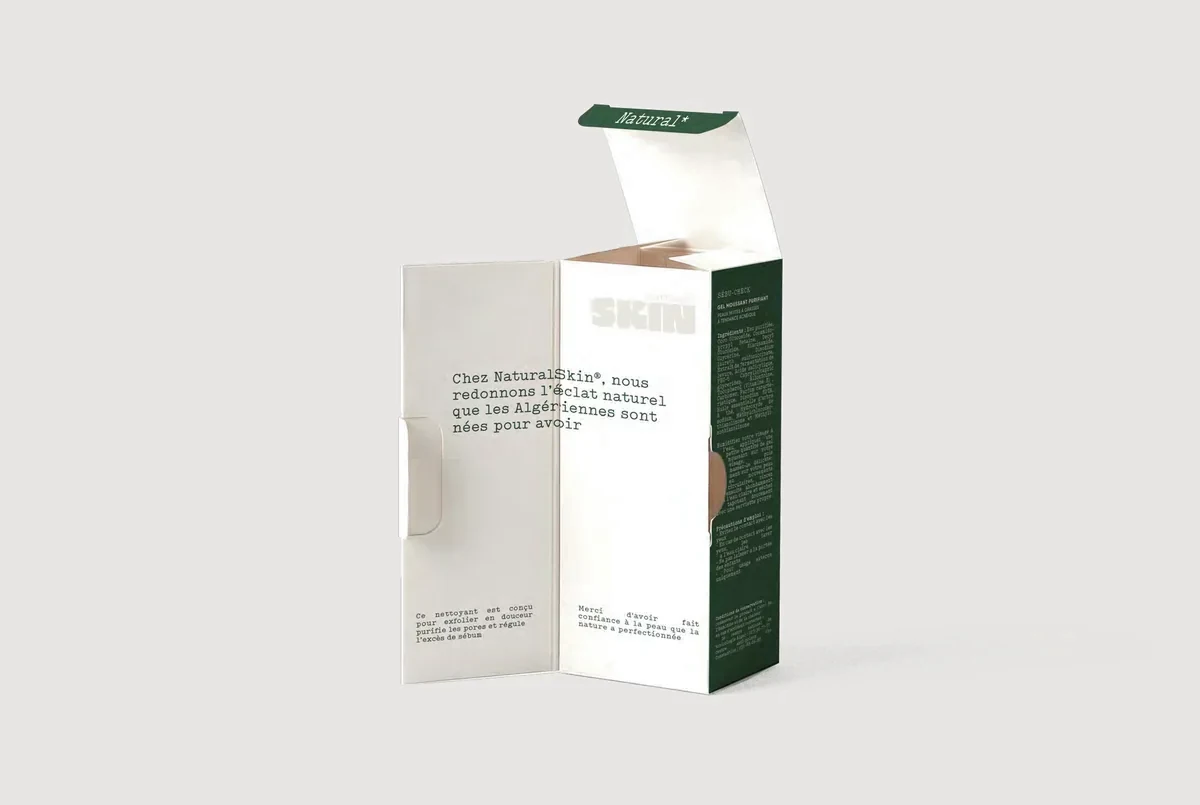 A Natural Skin carton opened to show the message printed on its inner face